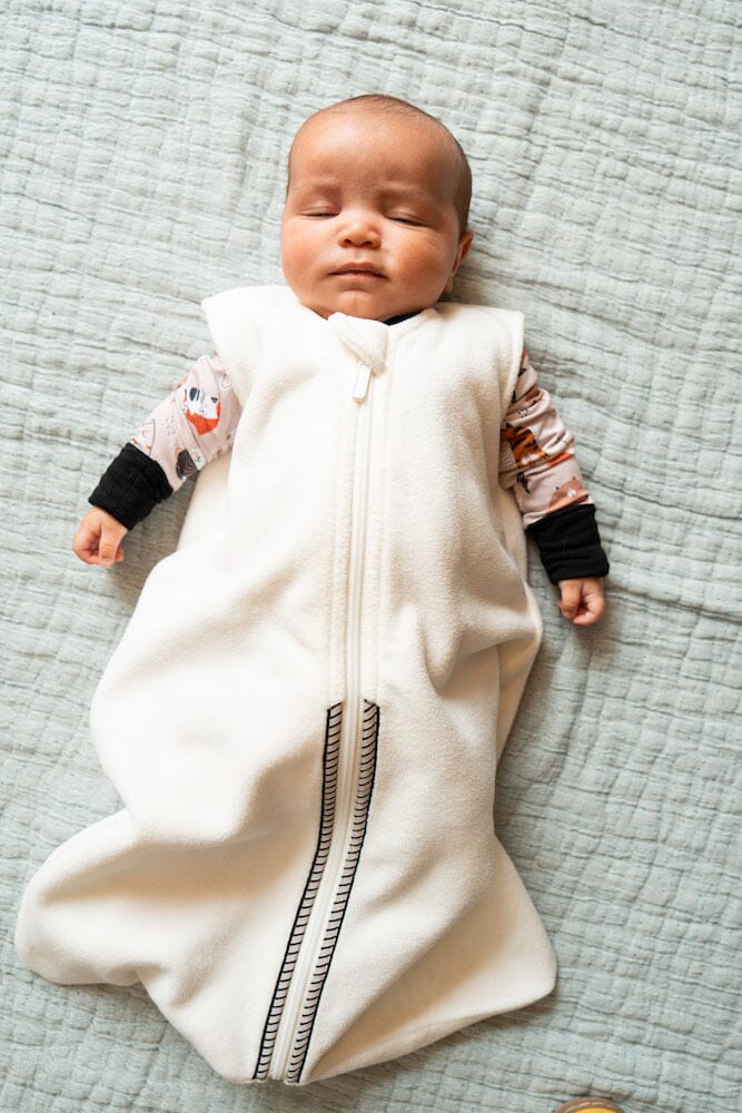 Baby sleep sack helps baby stay warm and safe while sleeping.