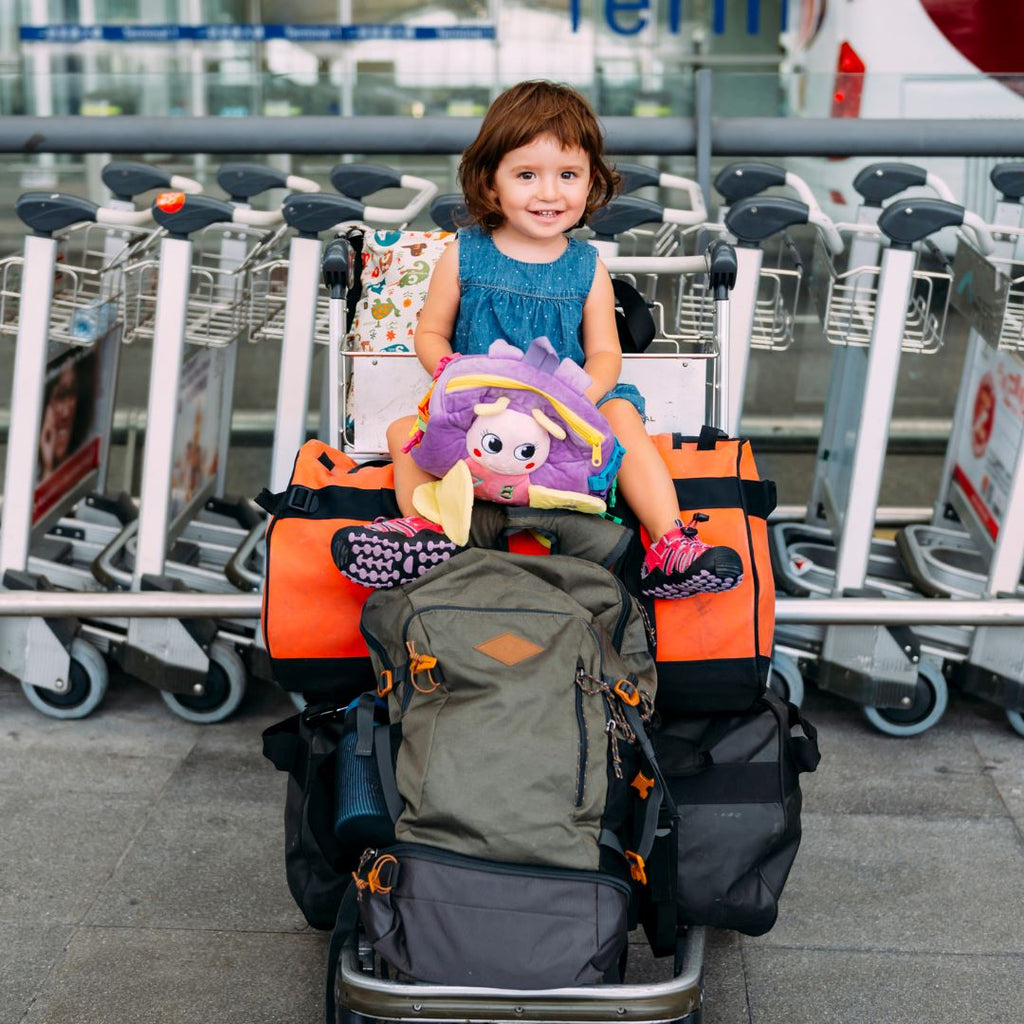 7 Must Know Tips For Flying with Kids from a Pilot (with all the travel delays)
